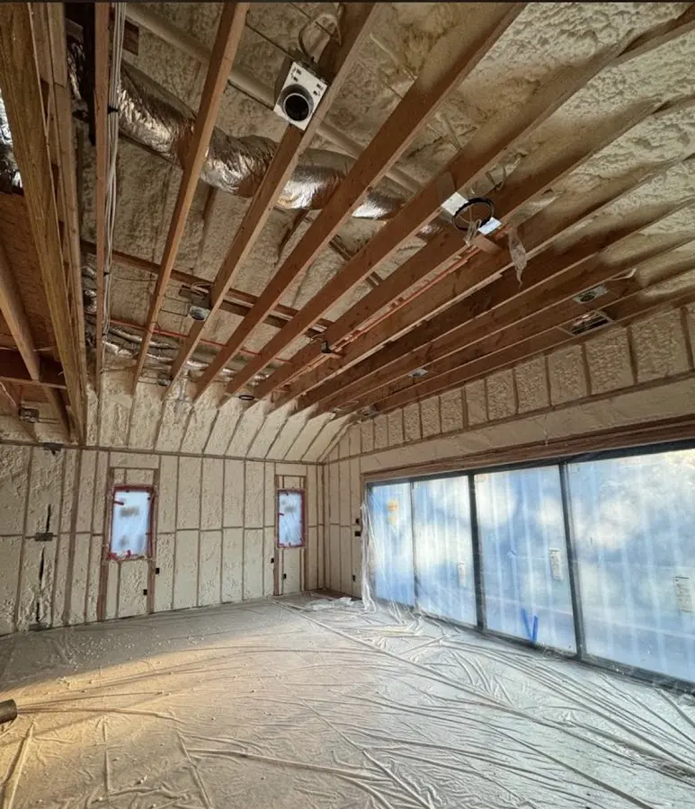 Interior walls and ceiling insulated with spray foam during new construction in Elk Plain